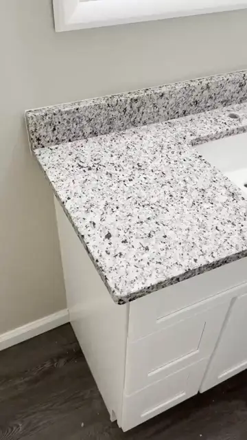 Granite vanity top with an undermount sink