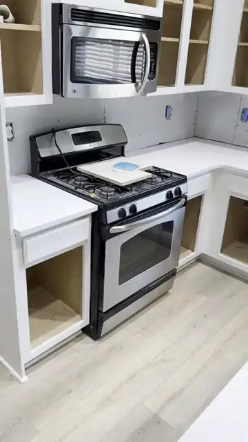 White veined counters set on new cabinets, install day